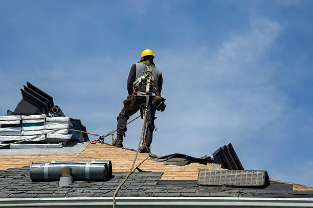 Professional Gutter Installation technician working in Rochester, MA